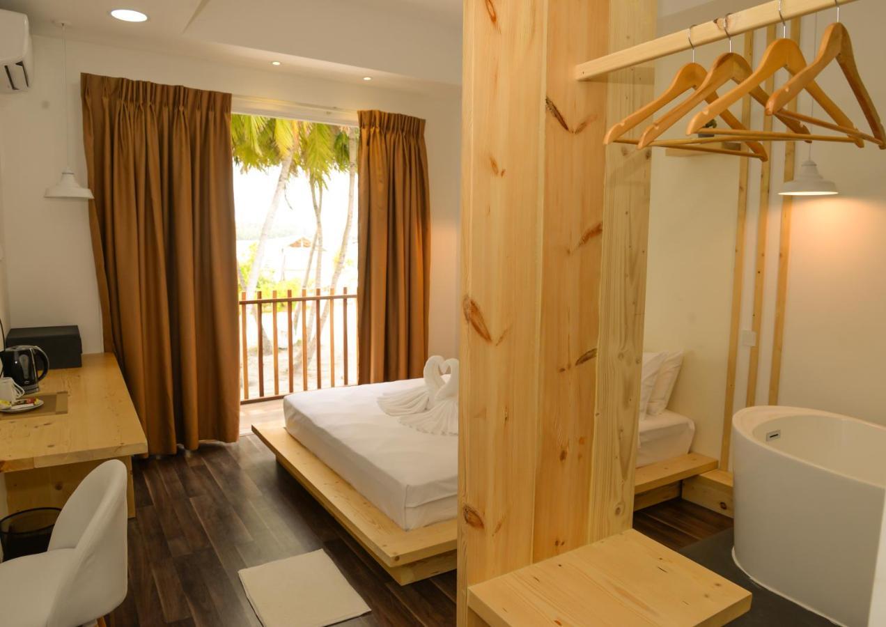 Portia Hotel & Spa Dhiffushi Exterior foto